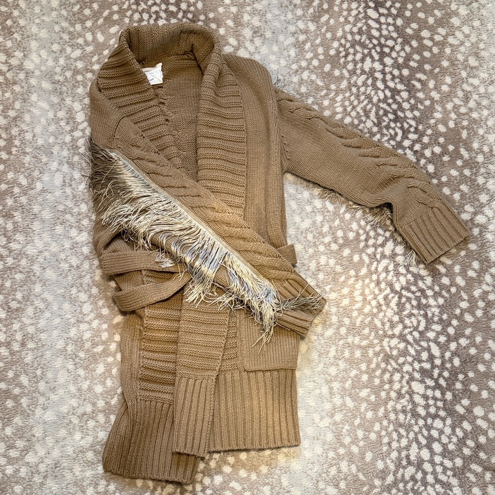 Understated Leather fringe sweater